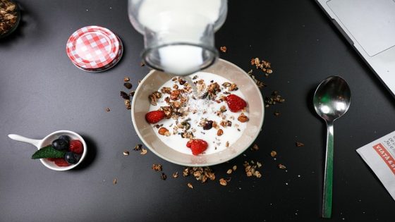 Greek yogurt with berries and nuts for healthy breakfast ideas