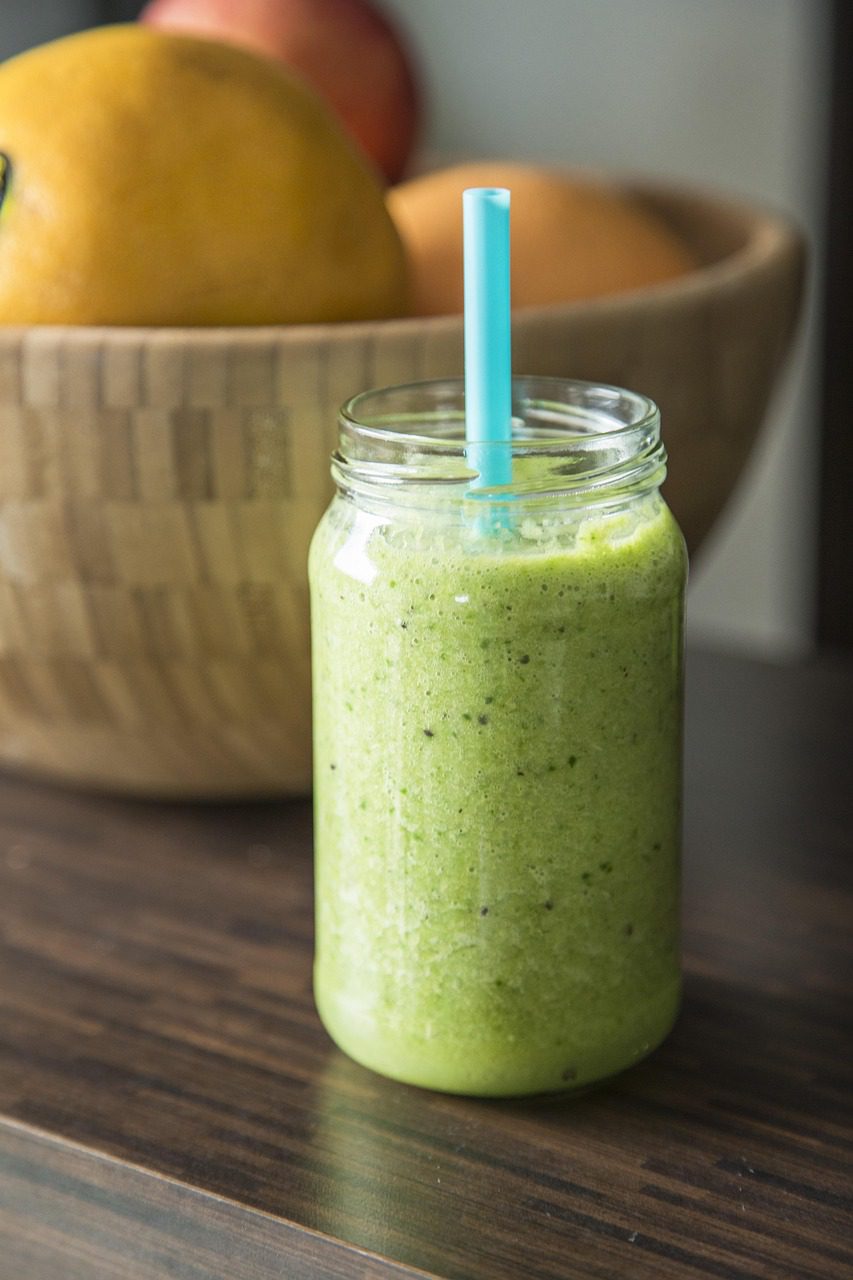 Fresh green smoothie made with spinach, kale, and banana