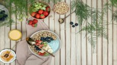 healthy breakfast after intermittent fasting with yogurt, fruits, and nuts