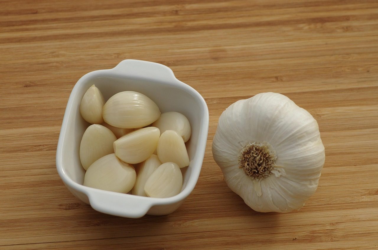 Fresh garlic cloves known for immune-boosting allicin